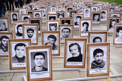 The Anglo-Iranian community, supporters of the National Council of Resistance of Iran (NCRI), remember the 30,000 victims of the 1988 massacre of political prisoners in Iran. Parliament Square, London, UK. 4th October 2019 (Photo credit should read Matthew Chattle / Barcroft Media / Barcroft Media via Getty Images)