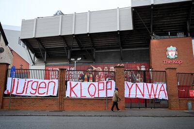 LIVERPOOL, ENGLAND - FEBRUARY 14: General view outside the stadium at Anfield as a sign is seen showing support for Liverpool manager Jugen Klopp on February 14, 2021 in Liverpool, England. (Photo by Michael Regan/Getty Images)