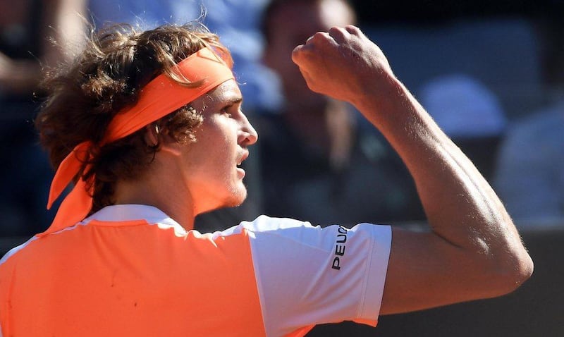 Alexander Zverev celebrates his semi-final win over John Isneon Saturday. Claudio Onorati / EPA