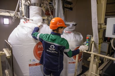 A worker operates a machine to fill sacks of Apaviva NPK(S) phosphate fertilizer at the PhosAgro-Cherepovets fertilizer plant, operated by PhosAgro, in Cherepovets, Russia. Andrey Rudakov/Bloomberg