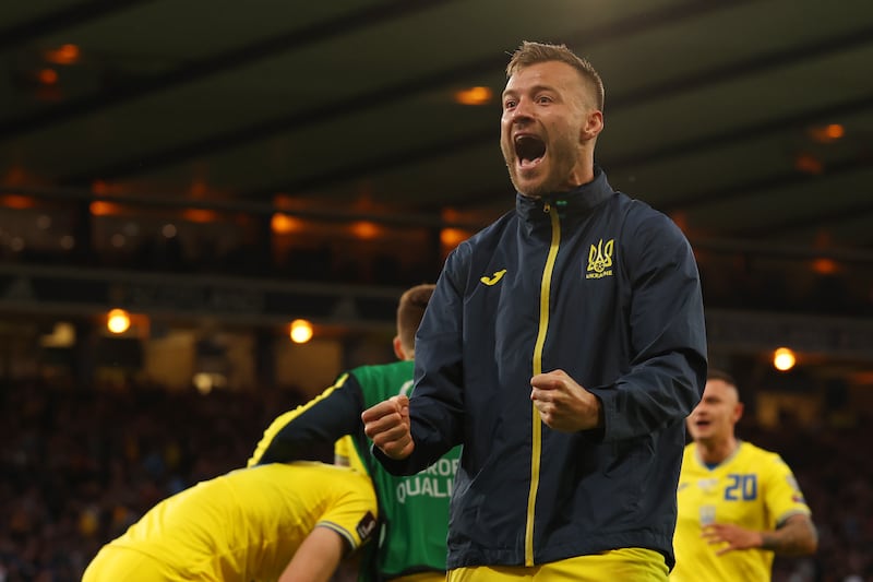 Andriy Yarmolenko of Ukraine celebrates with fans after the World Cup qualifying victory over Scotland at Hampden Park on June 01, 2022 in Glasgow, Scotland. Getty Images