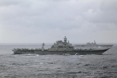 Indian naval ship INS Vikramaditya, foreground, and Japan's helicopter carrier Izumo participate in the trilateral exercises between India, Japan and US in the Bay of Bengal in 2017. AP Photo