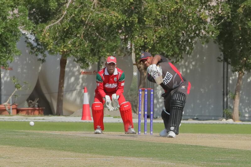 UAE, in grey, lost to Oman by five wickets in their World Cup League Two match on Sunday. Courtesy Oman Cricket