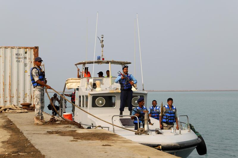 Yemeni coast guards prepare to escort a tug boat ferrying members of a Houthi delegation to attend a meeting of a committee overseeing a U.N.-led peace deal that will be held on board a U.N.-chartered ship off Yemen's port city of Hodeidah September 8, 2019. REUTERS/Abduljabbar Zeyad