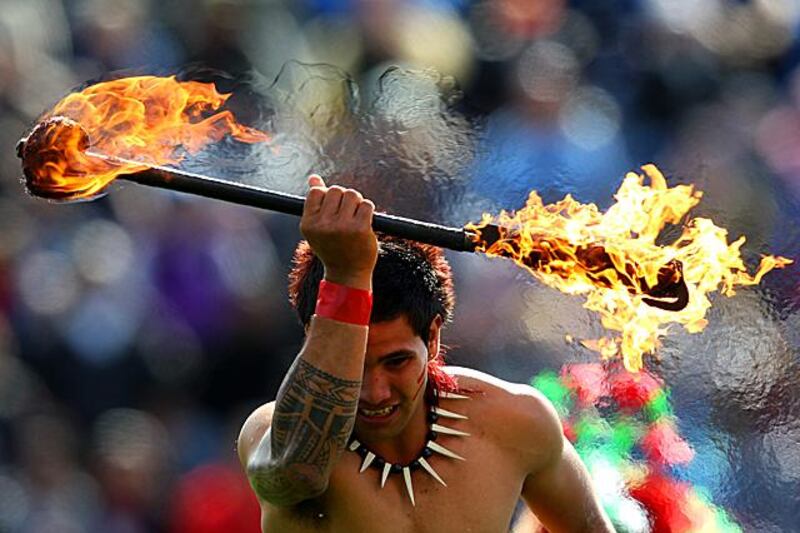 ROTORUA, NEW ZEALAND - SEPTEMBER 14:  A dancer performs prior to kickoff during the IRB 2011 Rugby World Cup Pool D match between Samoa and Namibia at Rotorua International Stadium on September 14, 2011 in Rotorua, New Zealand.  (Photo by Alex Livesey/Getty Images)