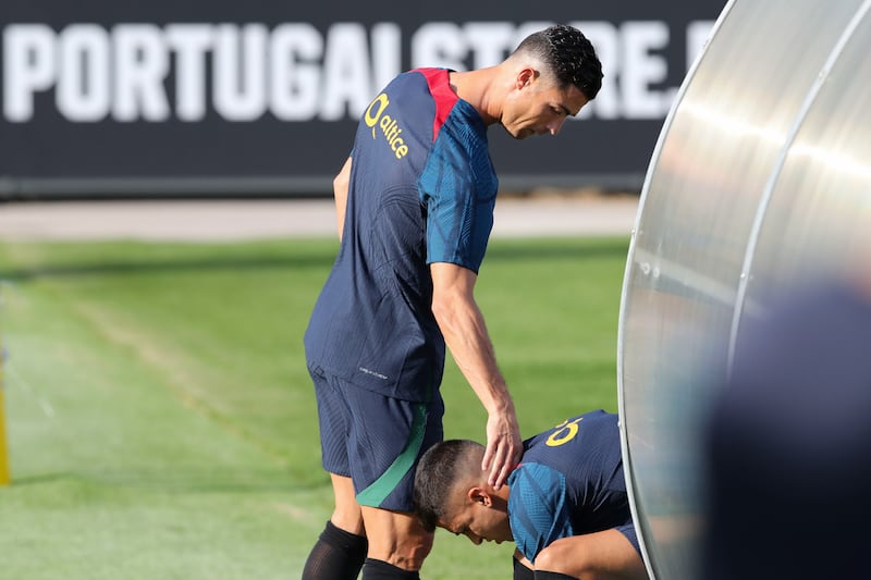 Portugal's Cristiano Ronaldo takes a break during training. EPA