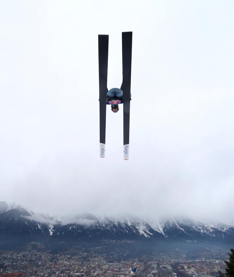 Slovenian ski jumper Timi Zajc soars through the air during the 68th Four Hills Tournament in Innsbruck, Austria, on January 4. AP