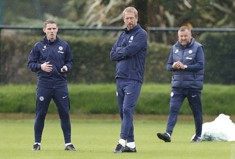 Chelsea manager Graham Potter, centre, with assistant managers Anthony Barry, left, and Billy Reid. PA
