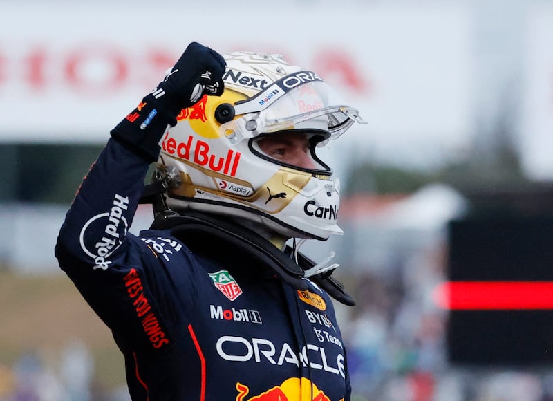 Max Verstappen celebrates winning the Japanese Grand Prix. Reuters