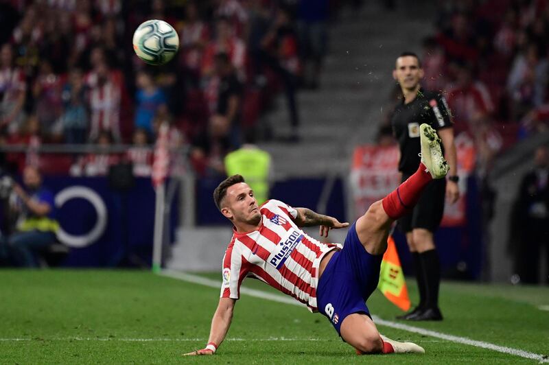 Atletico Madrid's Spanish midfielder Saul Niguez kicks the ball during the Spanish league football match between Club Atletico de Madrid and Real Madrid CF at the Wanda Metropolitano stadium in Madrid on September 28, 2019. / AFP / JAVIER SORIANO
