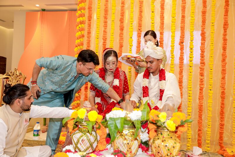 The wedding rituals usually take about three to four hours with the priest explaining the rituals. Photo: Suraj Negi
