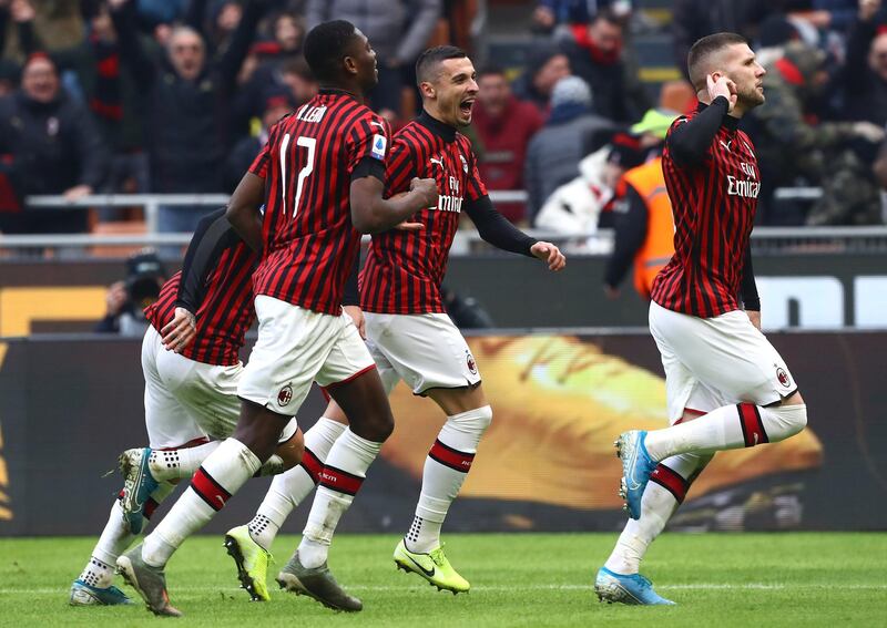 Ante Rebic celebrates his second goal for AC Milan against Udinese. Getty Images