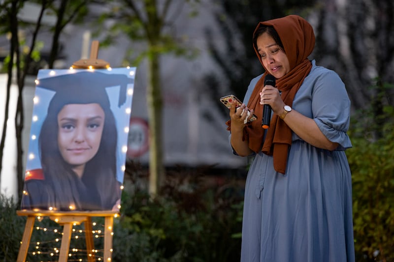 Jebina Yasmin Islam, Sabina's sister, speaks at a candlelight vigil. Getty Images