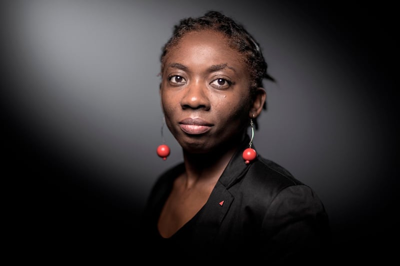 (FILES) In this file photo taken on November 24, 2017 French leftist La France Insoumise (LFI) member of Parliament Daniele Obono poses during a photo session in Paris.    The French conservative magazine Valeurs Actuelles has published a 'politic-fiction' article and illustration  on LFI MP Daniele Obono, portrayed as a slave, which sparked a wave of indignation, including French Prime Minister's condemnation, on August 29, 2020. / AFP / JOEL SAGET
