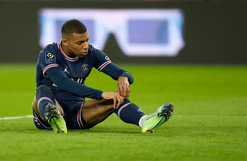 PSG's Kylian Mbappe reacts after sustaining an injury. AP Photo 