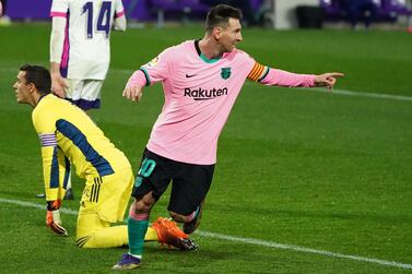 Barcelona's Argentine forward Lionel Messi celebrates after scoring a goal during the Spanish league football match between Real Valladolid FC and FC Barcelona at the Jose Zorilla stadium in Valladolid on December 22, 2020. / AFP / Cesar Manso