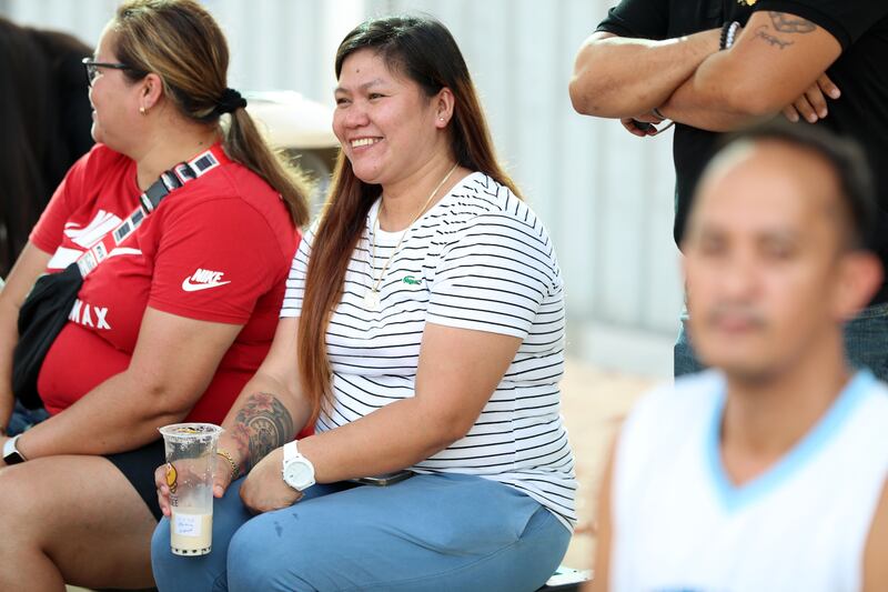 Filipinos in the UAE enjoy a basketball game before Independence Day celebrations. Chris Whiteoak / The National