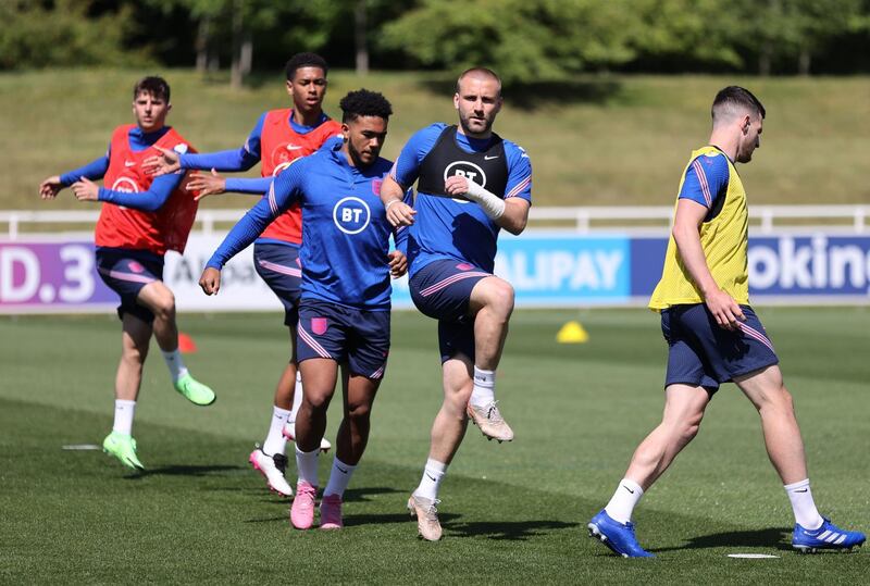England's Luke Shaw and Reece James, centre right and left, respectively, during training. Reuters