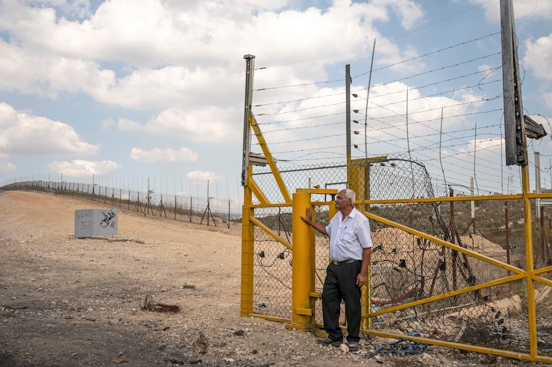 Palestinian farmer Mohammed Khasib, 65, by the Seam Zone in Qaffin. Tanya Habjouqa / Noor for The National