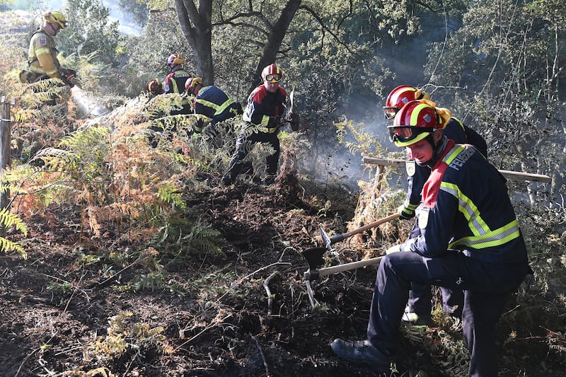 German firefighters fighting a forest fire as part of the European Civil Protection co-operation in Hostens, in the Gironde region of south-western France. EPA