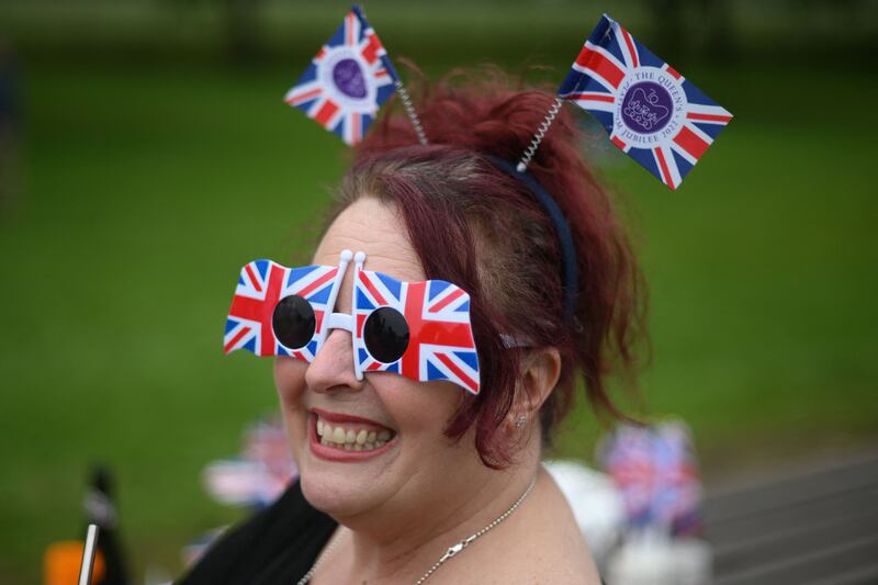 A woman celebrating ahead of the Big Jubilee Lunch on The Long Walk in Windsor. AFP