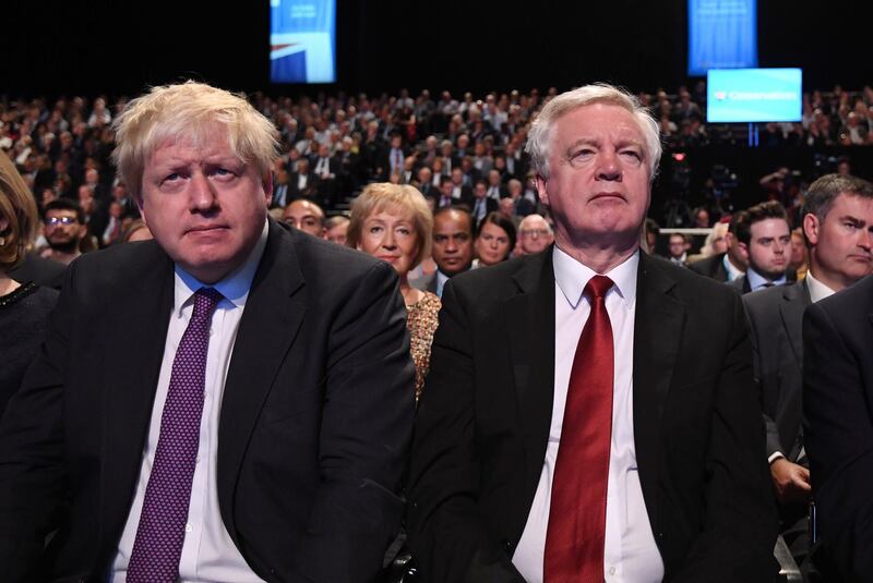 epa06875940 (FILE) - Britain's Foreign Secretary Boris Johnson (L) and Secretary of State for Exiting the EU David Davis (R) watch Prime Minister Theresa May (unseen) delivering her speech on the final day of Conservative Party Conference in Manchester, Britain, 04 October 2017, (reissued 09 July 2018). Media reports on 09 July 2018 state that Boris Johnson resigns as British Foreign Secretary, following the resignation of Brexit Secretary David Davis the day before.  EPA/FACUNDO ARRIZABALAGA *** Local Caption *** 53809026