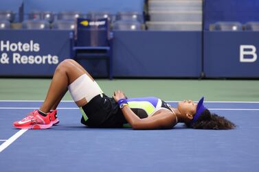 NEW YORK, NEW YORK - SEPTEMBER 12: Naomi Osaka of Japan lays down in celebration after winning her Women's Singles final match against Victoria Azarenka of Belarus on Day Thirteen of the 2020 US Open at the USTA Billie Jean King National Tennis Center on September 12, 2020 in the Queens borough of New York City. Al Bello/Getty Images/AFP == FOR NEWSPAPERS, INTERNET, TELCOS & TELEVISION USE ONLY ==