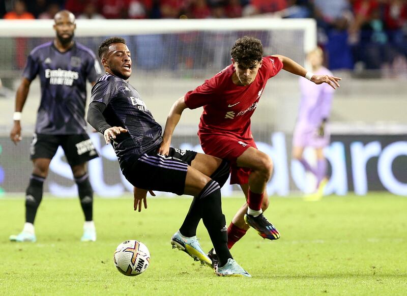 Lyon's Corentin Tolisso in action with Liverpool's Stefan Bajcetic. Reuters