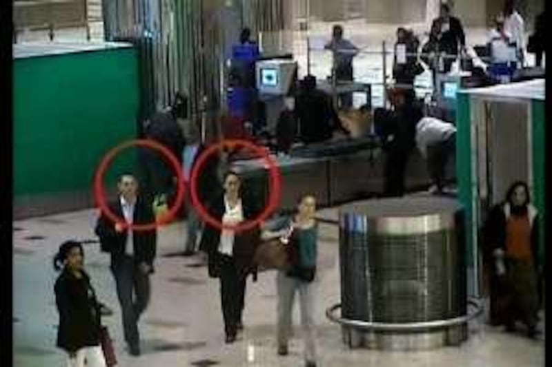 An image grab taken from a video released by Dubai police on February 24, 2010 allegedly shows two suspects in last month's murder of top Hamas militant Mahmud al-Mabhuh, at the airport in the Gulf emirate. Pressure mounted on Israel on February 25 as Australia became the latest country seeking answers over the use of Western passports in the Dubai killing by suspected Mossad agents of a top Hamas militant. AFP PHOTO/DUBAI POLICE == RESTRICTED TO EDITORIAL USE == *** Local Caption ***  953657-01-08.jpg