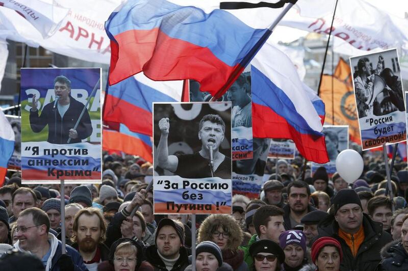 People take part in a rally in memory of Russian opposition politician Boris Nemtsov on the first anniversary of his murder in Moscow, Russia, February 27, 2016. REUTERS/Sergei Karpukhin