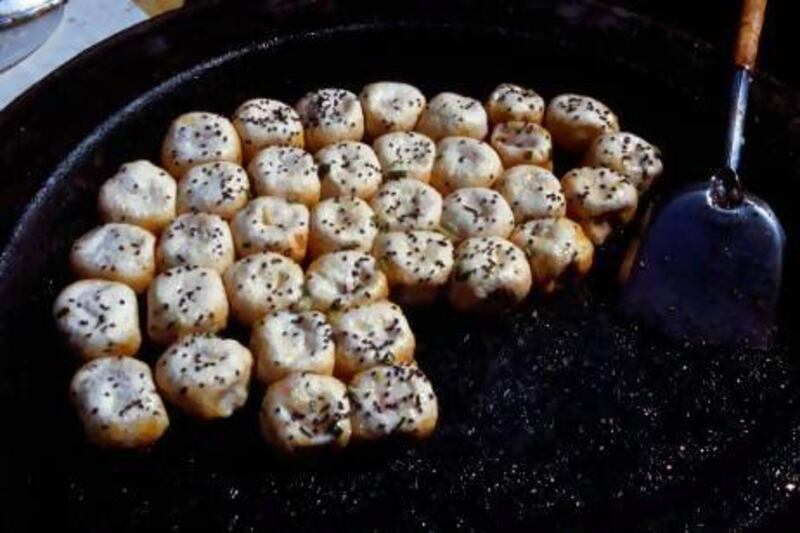 Shengjian, or fried dumplings, on offer at stall.