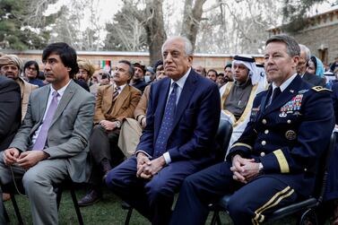 US envoy for peace in Afghanistan Zalmay Khalilzad (C) and US Army General Scott Miller, commander of NATO's Resolute Support Mission and United States Forces  Afghanistan, attend Afghanistan's President Ashraf Ghani's inauguration as president, in Kabul, Afghanistan March 9, 2020. Reuters