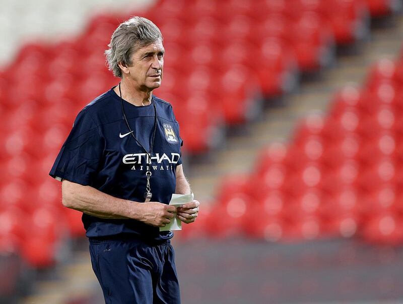 Manager Manuel Pellegrini during Wednesday night's Manchester City training session in Abu Dhabi. Satish Kumar / The National / May 14, 2014