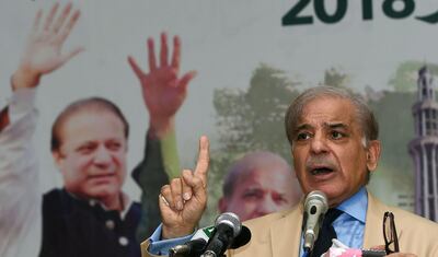 Shahbaz Sharif, the younger brother of ousted Pakistani prime minister Nawaz Sharif, and head of the Pakistan Muslim League-Nawaz (PML-N), presents his party manifesto for the forthcoming general election in Lahore on July 5, 2018. Pakistan will hold a general election on July 25 pitting the Pakistani Muslim League-Nawaz (PML-N) against its main rival, the Pakistan Tehreek-e-Insaf party, led by cricket star-turned-politician Imran Khan. / AFP / ARIF ALI
