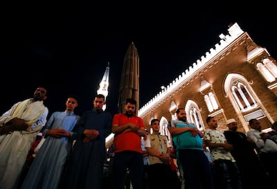 Muslim worshippers outside the Al Hussein mosque in Cairo. Reuters