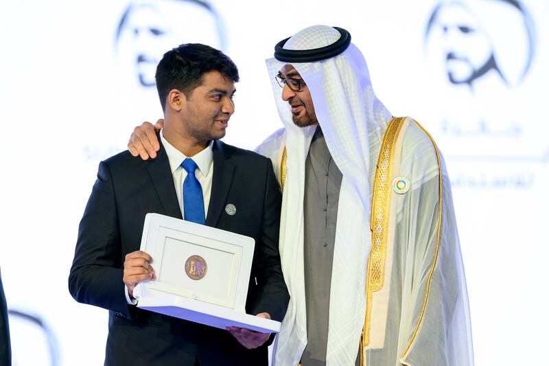 Sheikh Mohamed presents the 2023 Zayed Sustainability Prize for South Asia Global High Schools to a representative from Dhaka Residential Model College (Bangladesh). Photo: UAE Presidential Court
