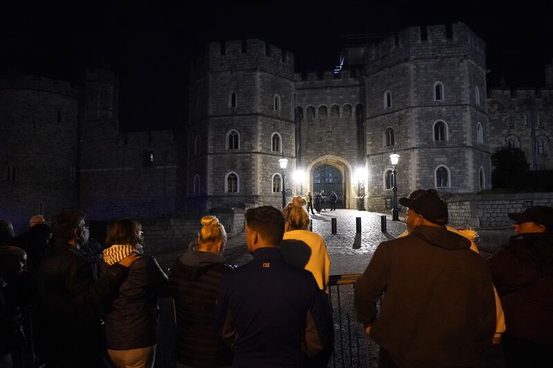 Mourners gather outside Windsor Castle, Berkshire. PA