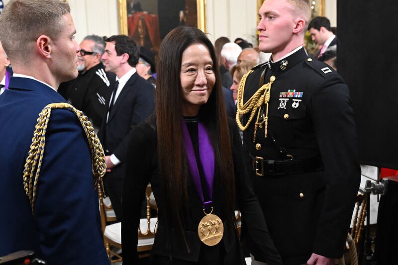 Ms Wang departs after being awarded with the 2021 National Medal of Arts during a ceremony at the White House. AFP