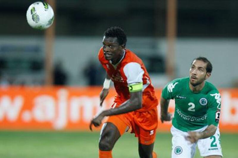 It appears that Ibrahima Toure, left, is running out on Ajman and on his way to Monaco in the French Ligue 2.