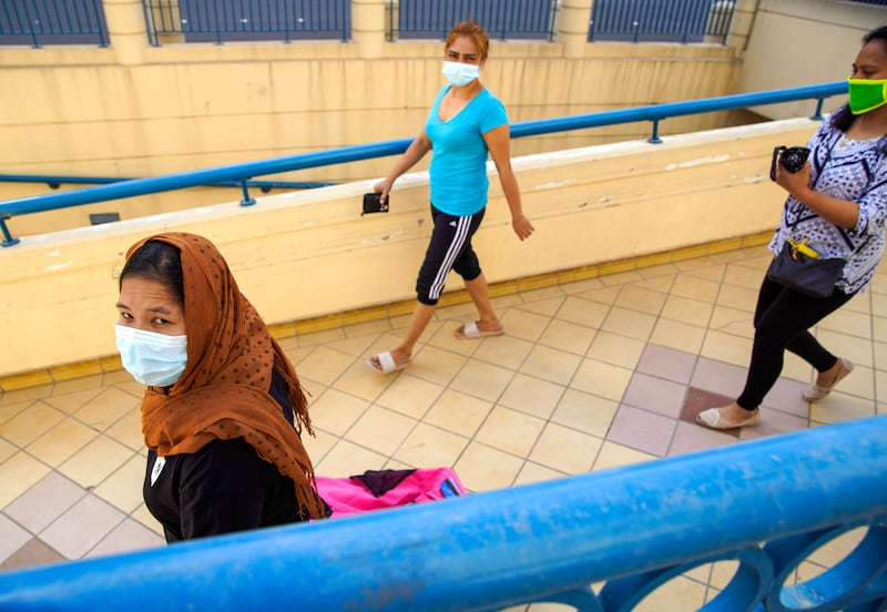 Abu Dhabi, United Arab Emirates, April 6, 2020.   Abu Dhabi residents take the underpass in front of the Al Wahda Mall.  UAE health ministry advised residents to wear a mask when they are outside, whether they are showing symptoms of Covid-19 or not.
 Victor Besa / The National
Section:  NA
Reporter: