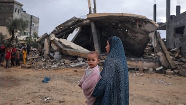 Palestinians inspect the destruction after overnight Israeli strikes on Rafah. AFP