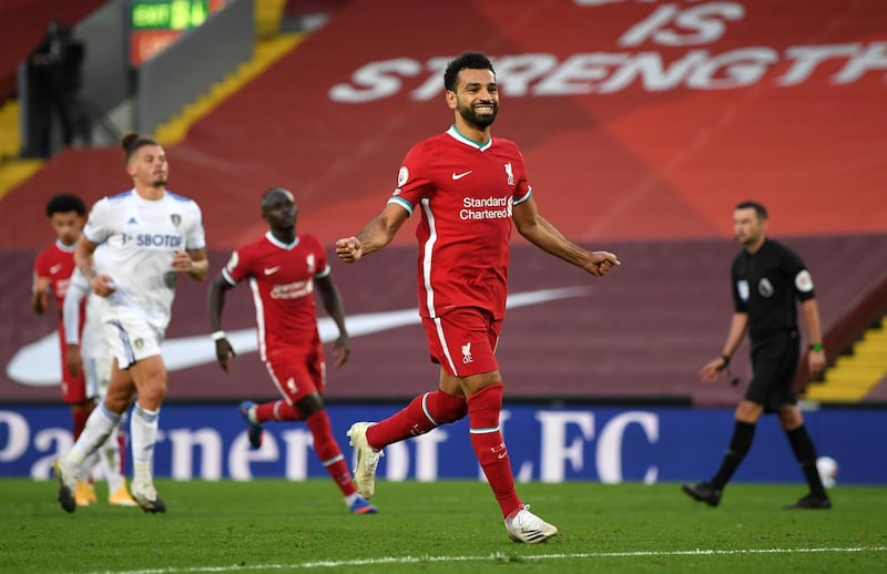 LIVERPOOL, ENGLAND - SEPTEMBER 12: Mohamed Salah of Liverpool celebrates after scoring his team's fourth goal  during the Premier League match between Liverpool and Leeds United at Anfield on September 12, 2020 in Liverpool, England. (Photo by Shaun Botterill/Getty Images)