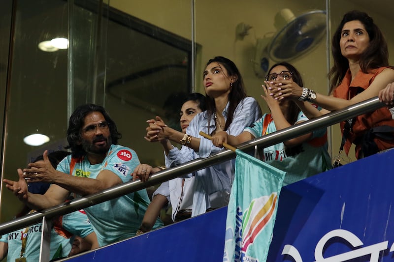Bollywood actor Suniel Shetty, left, with daughter and actress Athiya Shetty during the IPL match between Rajasthan Royals and Lucknow Super Giants at the Wankhede Stadium in Mumbai on Sunday, April 10. 2022. Sportzpics for IPL