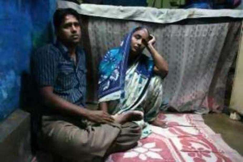 Aftab Alam Ansari and his mother Ayesha Bibi. Cooped up inside a 7 feet x 10 feet room in a Calcutta slum Aftab lives with seven other members of his family, including his wife and five siblings. From Calcutta in 2007 Aftab was picked up by police as a suspected terrorist responsible for a bomb blast in north India. Aftab was tortured badly in custody by police in north Indian city of Lucknow for 3 weeks, before being acquitted by the court.
 
Pics by: Shaikh Azizur Rahman   *** Local Caption ***  Framed Terrorist A.jpg