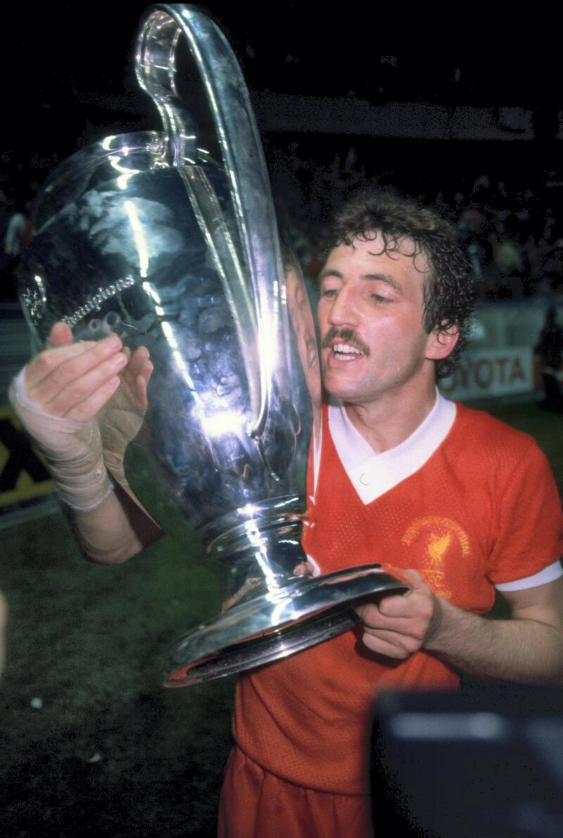 27 May 1981:  Alan Kennedy of Liverpool who scored the only goal of the match kisses the trophy after the European Cup final between Liverpool and Real Madrid in Paris. Liverpool won the match 1-0.                            \ Mandatory Credit: Allsport UK /Allsport