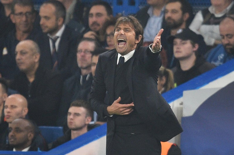 Chelsea's Italian head coach Antonio Conte gestures during a UEFA Champions league group stage football match between Chelsea and Roma at Stamford Bridge in London on October 18, 2017. / AFP PHOTO / Glyn KIRK