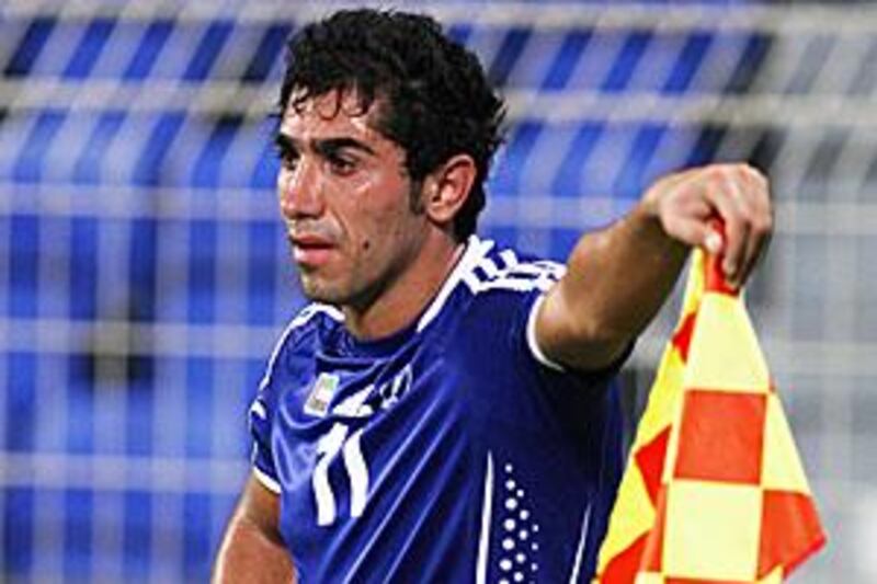 Al Nasr's Madanchi scored twice to knock Al Ain's title chances.