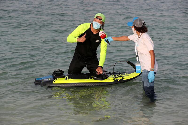 Dubai, United Arab Emirates - Reporter: N/A. Sport. People compete in the moto surf section of the Dubai Watersports Summer Week. Thursday, June 25th, 2020. Dubai. Chris Whiteoak / The National