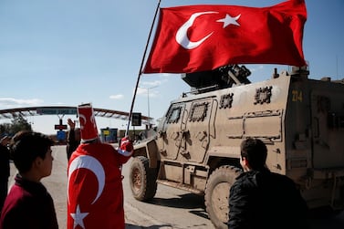 Turkish forces' armoured vehicles push into Syria in 2018 in one of the many military ventures mounted by President Erdogan that are causing increased instability. AP  