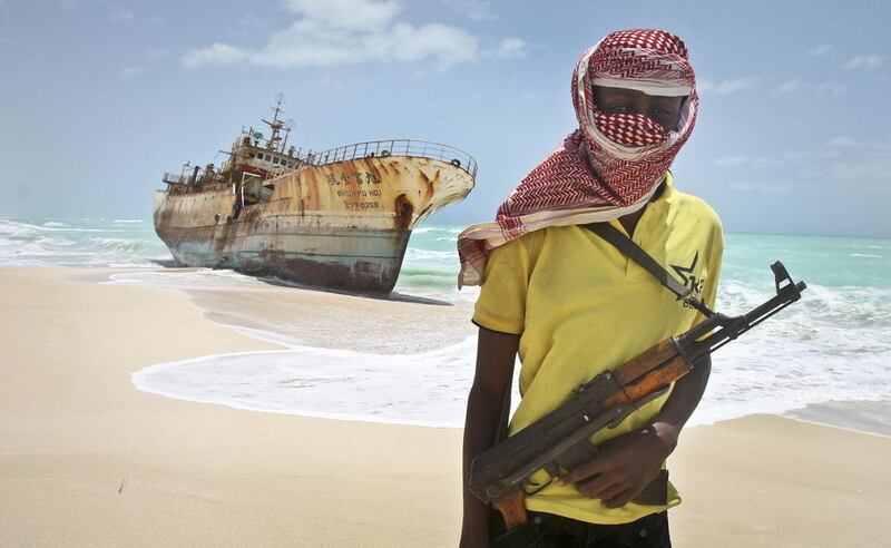 Somali pirate Hassan stands in the once-bustling centre of Hobyo, Somalia. Three hijackings in one month have authorities warning of the pirates’ resurgence.  Farah Abdi Warsameh / AP Photo